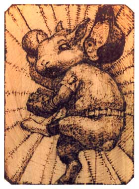 うさぎの「ぷう太郎」のピッチャー姿を板に描いた半田ゴテ画